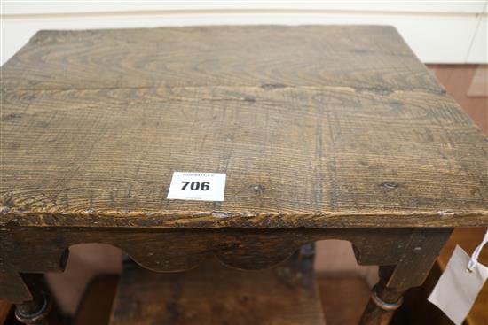 A rustic oak side table, W.52cm